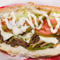 Steak Sub · Grilled onions, mushrooms, green peppers, lettuce, tomatoes, pickles, mayo and Swiss.