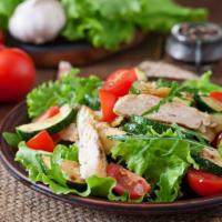 The Turkey Salad · Fresh salad made with crispy lettuce, cherry tomatoes, black olives, diced onions, oregano, ...