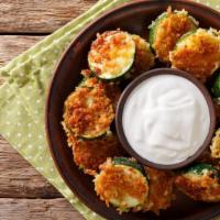 Breaded Zucchini · Fresh zucchini breaded and fried till golden-brown.