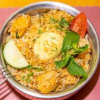 Hydrabadi Chicken Biryani · Chicken cooked with basmati rice and aromatic spices.