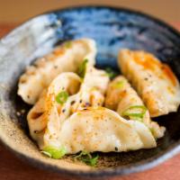 Sui Gyoza (6 Pcs) · Boiled dumplings with spicy ponzu sauce.