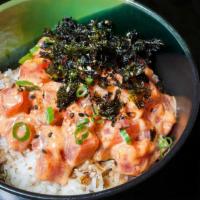 Cat Rice · Tuna sashimi over rice with spicy mayo, iwanori and truffle oil.