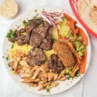 Combination Feast · Combination of beef shish kabob, kifta kabob, chicken shawarma, and falafel. Add extra ingre...