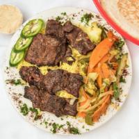 Beef Shish Kabob Entrée · Grilled pieces of marinated tender beef.