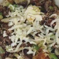 Philly Skillet · Home fries mixed with green peppers, onions, Philly steak and topped with Swiss cheese.