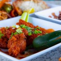Chicken Wings (8) · Lightly breaded fried chicken chicken wings with your choice of sauce.