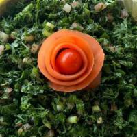 Tabbouli · Chopped parsley, tomatoes, xcallion, mint, cracked wheat mixed with lemon juice, olive oil, ...
