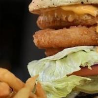 Fatuma'S Tower · Two patties, grilled bacon, two cheese sticks, onion rings, four cheese, pickles, lettuce, t...