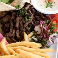 Meat Shawarma  · Marinated tender meat charbroiled and sliced.