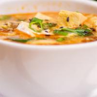 Hot & Sour Soup · Spicy. Whisk egg, tofu, wood ear, bamboo shoot and scallions in a spicy and sour chicken bro...