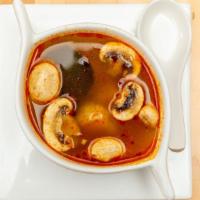 Tom Yum Soup · Hot and spicy. Jumbo shrimps, mushroom, chili pepper, lemon grass, and kafir leaf, cilantro ...