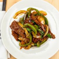 Black Pepper · Spicy black pepper sauce with green bell peppers and onion.