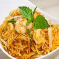 Pad Thai · Spicy. Thin rice noodles, egg, carrot and onion in a sweet and sour sauce topped with crushe...