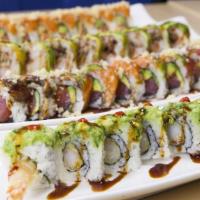 Dragon Roll · Shrimp tempura and cucumber topped with avocado and eel with eel sauce with eel sauce.