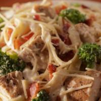 Pasta Alfredo · 1840 cal. Fettuccine with alfredo sauce and broccoli. Topped with applewood smoked bacon, di...