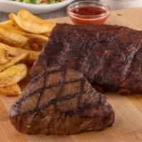 Sirloin & Ribs · 1220-1470 cal. Six-ounce sirloin with a half order of ribs. Served with apple coleslaw.