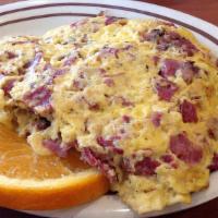 Meat Lovers Omelette · Grilled corned beef, pastrami, and salami. Comes with your choice of bagel, bialy, or toast.