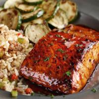 Hickory Bourbon Salmon · A grilled salmon fillet glazed with bourbon BBQ. Served with your choice of two sides.