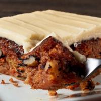 Carrot Cake · Triple layered with walnuts and cream cheese icing.