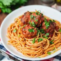Spaghetti & Meatballs · Classic Italian dish, perfectly cooked meatballs, served on a bed of spaghetti pasta.