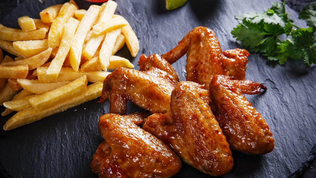 Bbq Wings With Fries · Hot & Crispy Chicken wings, seasoned and fried to perfection, and tossed in BBQ sauce. Served with a side of Fries.