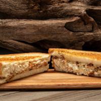 The Ontario · Sous vide & seared chicken breast, Swiss cheese, turkey bacon, caramelized onions, and house...