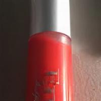 Why You Never Redy · Clear gloss with raspberry red shimmer