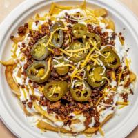 Mexican Fries · Chorizo, sour cream, shredded cheese, and jalapeños.