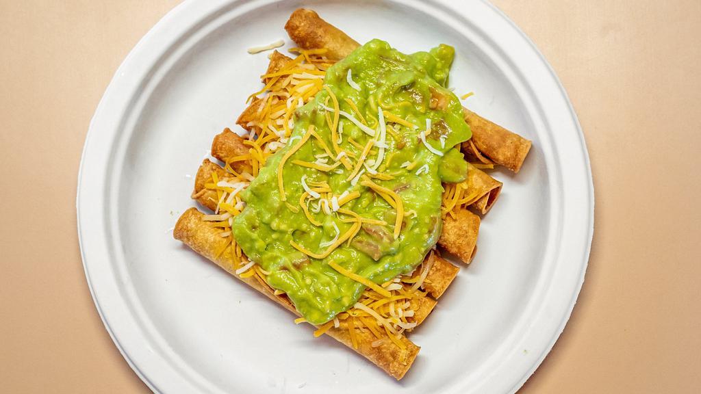3 Flautas With Guacamole & Cheese · With rice and beans.