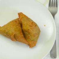 Samosa (2 Pieces) · Fried crispy shell stuffed with spiced potatoes, peas, coriander and served with chutney.