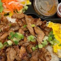 *C8. Com Trung Thit Nuong · Grilled pork loin (boneless), overy easy egg, steamed rice, side salad