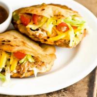 Gorditas · Chicharron - pork skin, rajas con queso - peppers with cheese.