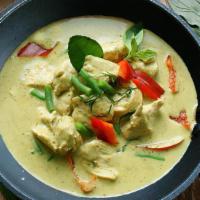 Spicy Green Curry · Spicy green curry (4/5 heat scale) with bamboo shoots, pea pods, bell pepper strips, and fre...