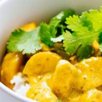 Yellow Curry · Mild spiced yellow coconut curry with gold potatoes, caramelized onions, fresh green beans, ...