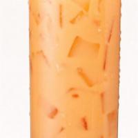Thai Iced Tea · Sweetened black tea brewed with spices and topped with organic cream.  20 oz.