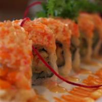 Family Special Roll · Favorite. Shrimp tempura, cucumber and avocado topped with crunch, crabstick, masago and mis...