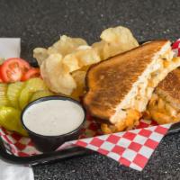 Buffalo Chicken Sandwich · Sliced chicken and melted mozzarella topped with blue cheese crumbles and bold buffalo sauce...