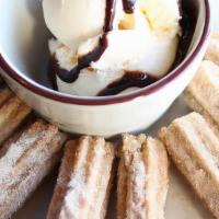 Churros W/Ice Cream · Each churro is filled with choice of filling or plain, topped with cinnamon sugar and side o...