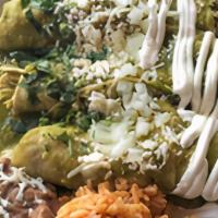 Enchiladas Verdes · Filled with chicken and mozzarella. Topped with a homemade roasted tomatillo sauce, cilantro...