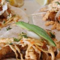 3 Fish Tacos · Tilapia dipped in a signature beer-batter and flash-fried in a flour tortilla with lime slaw...