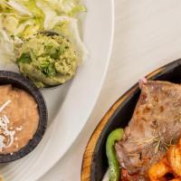 Surf N’ Turf Combo Fajitas · Sautéed Bell peppers, onions and tomatoes on a hot skillet. Served with lettuce, Pico de Gal...