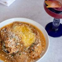 Chiles Rellenos Dinner · Two chiles rellenos stuffed with cheese, topped with salsa ranchero. Served with rice, beans...
