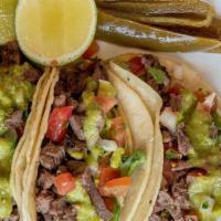 Taco Dinner · Three tacos on corn tortillas, choice of steak, ground beef, chicken, Al Pastor or veggie wi...