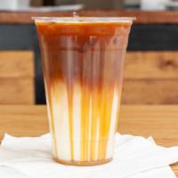 Iced Caramel Macchiato · A Sweet-to-Savory, Milk based drink sweetened with Vanilla and topped with Espresso and Cara...