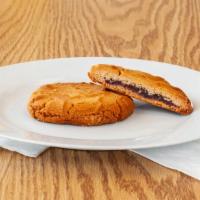 Pb&J Cookie · A Rich, Delicious Peanut Butter cookie with a Raspberry Jelly Filling.