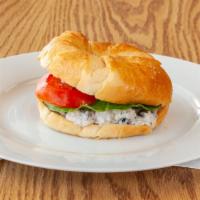 Chicken Salad Sandwich With Lettuce & Tomato On Croissant · Contains pecans.
