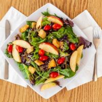 Café Salad · Mixed greens topped with apples, shaved Parmesan cheese, cranberries and croutons. Add chick...
