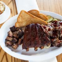 Ribs & Two Meat (One Side) · Three pork spare ribs and your choice of two types of smoked meat.  Plus your choice of one ...