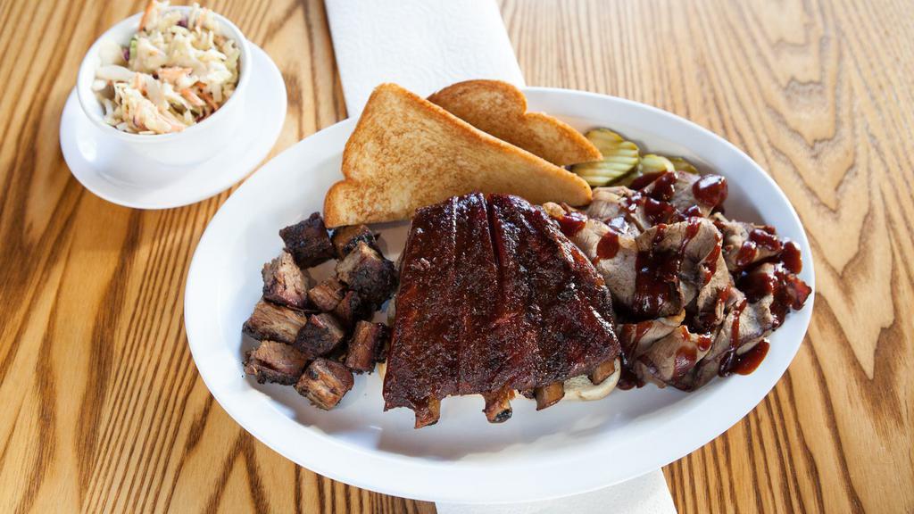 Ribs & Two Meat (One Side) · Three pork spare ribs and your choice of two types of smoked meat.  Plus your choice of one side.