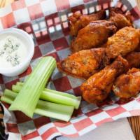 Buffalo Wings · Smoked and deep fried.  Tossed in our buffalo hot sauce.  Served with celery